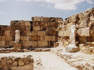 Defaced statues of the gods